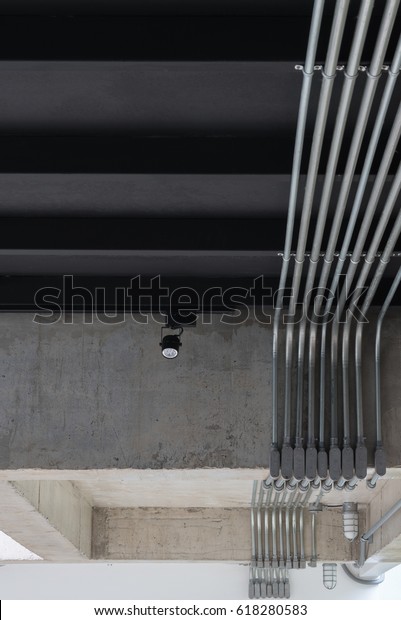 Exposed Black Ceiling Track Light Conduit Abstract Interiors