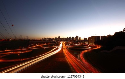 Exposure of night traffic in modern city - Shutterstock ID 1187034343