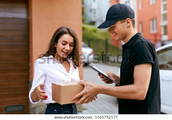 Express Delivery Service. Courier Delivering\
Package To Woman