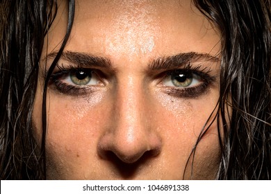 Expression in female athlete eyes showing focus, determination, conviction, power, courage
