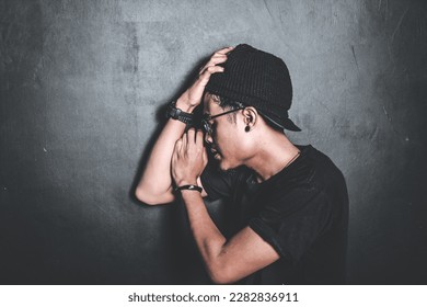 expression of a man in depression - Shutterstock ID 2282836911