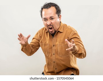 Expression And People Concept - Angry Man With Funny Face Over Gray Background (cartoon Style Character With Big Head). Adult Over 40 Years Of Age.