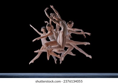 Expressive, artistic dance. Ground of young tented people, ballet dancers in motion, dancing against black background. Concept of classical and modern dance, beauty, creativity, art, theater