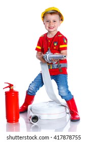 Expressive cute toddler boy with fireman's outfit on. Isolated on the white background