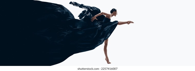 Expressive dane. Young woman, professional ballerina performing in black amazing dress over white background. Concept of art, beauty, dance aesthetics, choreography. Banner. Copy space for ad - Powered by Shutterstock