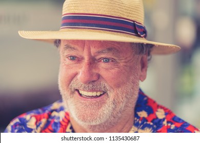 Expressive face expressions on good looking senior man casual summer dressed happy, funny and characteristic in life is too short live the most you can concept.