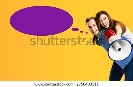 Expressive happy couple using mega phone. Man and woman shout yell say advertise use loudspeaker megaphone. Sales ad concept. Isolated purple background. White mockup empty speech bubble speechbubble