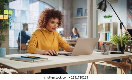 Expressive Multiethnic Middle Eastern Female Working on a Creative Job Position in a Advertising Company. Manager Thinking About a Good Email Reply, Brainstorming Ideas for Future Marketing Campaign. - Shutterstock ID 2231710263