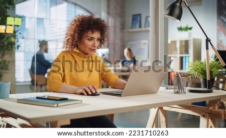 Expressive Multiethnic Middle Eastern Female Working on a Creative Job Position in a Advertising Company. Manager Thinking About a Good Email Reply, Brainstorming Ideas for Future Marketing Campaign.