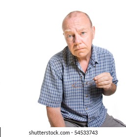 Expressive Old Man Looking Serious Isolated Against White Background.