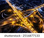 Expressway top view, Road traffic an important infrastructure, Drone aerial view fly in circle, traffic transportation, Public transport or commuter city life concept of economic and energ, transport.