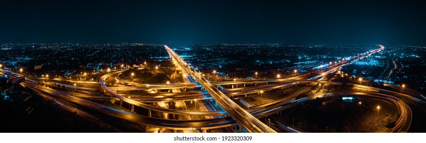 Expressway top view, Road traffic an important infrastructure in Thailand. Road and Roundabout, multilevel junction motorway, Panorama Aerial view - Powered by Shutterstock