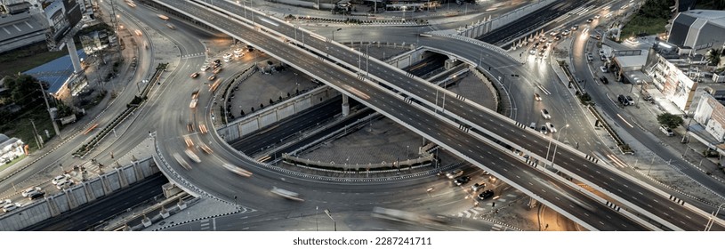 Expressway top view, Road traffic an important infrastructure, Drone aerial view fly in circle, traffic transportation, Public transport or commuter city life concept of economic and energ, transport.