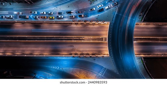 Expressway top view, Road traffic an important infrastructure, Drone aerial view fly in circle, traffic transportation, Public transport or commuter city life concept of economic and energ, transport. - Powered by Shutterstock