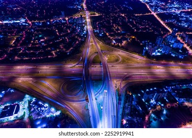 Expressway view from above. Almost empty interchange highway road at night in Canada.