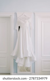 Exquisite bridal ensemble emphasizing refined lace craftsmanship and subtle natural glow for elegance