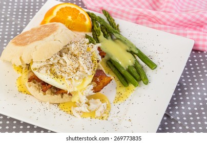 Exquisite Dinner Of Lump Crab Meat Over Eggs Benedict With Bearnaise Sauce Over Asparagus.