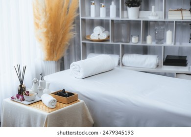 Exquisite display of beauty treatment and spa salon accessories arranged on spa table in luxury spa resort. Relaxing spa massage and recreation background concept. Quiescent - Powered by Shutterstock