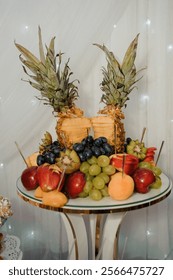 Exquisite Fruit Arrangement with Pineapples and Assorted Fresh Fruits.
