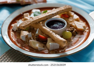 Exquisite Gourmet Cheese Platter with Fresh Fruits and Artisanal Bread Sticks. - Powered by Shutterstock