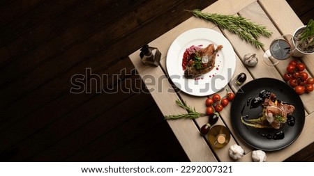 Exquisite Italian cuisine in a restaurant on a black background.