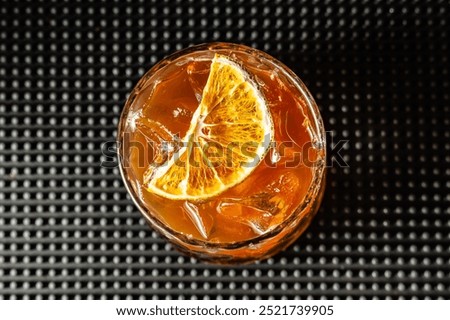 Exquisite old fashioned in luxurious bar in Colombia. Cocktail made with whiskey.