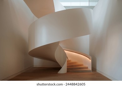 An exquisite view of a modern spiral staircase, encapsulating the sleek and minimalist aesthetic of contemporary architecture.  - Powered by Shutterstock