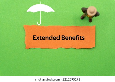 Extended Benefits.The Word Is Written On A Slip Of Colored Paper. Insurance Terms, Health Care Words, Life Insurance Terminology. Business Buzzwords.