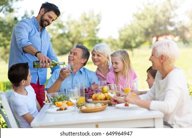 Extended Family Eating Outdoors