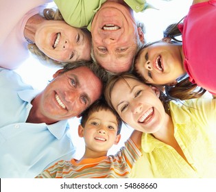 Extended Family Group Looking Down Into Camera