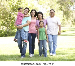 Extended Family Group Walking In Park