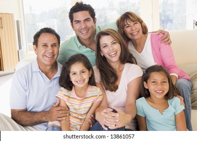 Extended Family In Living Room Smiling