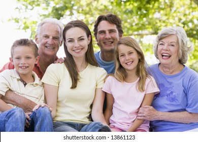 Extended Family Outdoors Smiling