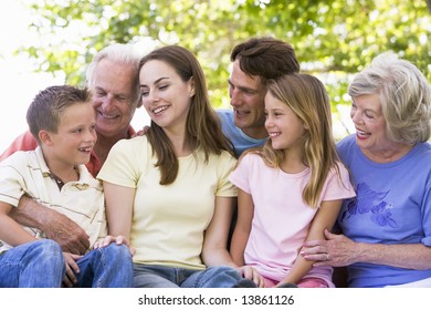 Extended Family Outdoors Smiling