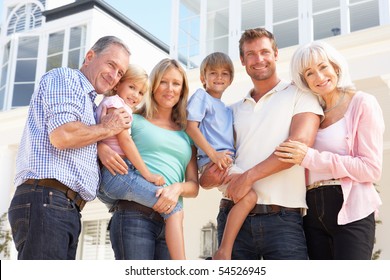 Extended Family Outside Modern House