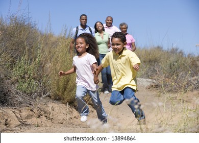 Extended Family Walking In Countryside