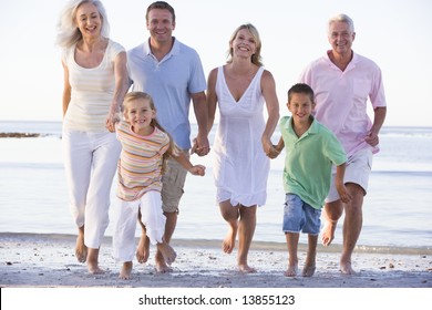 Extended Family Walking On Beach