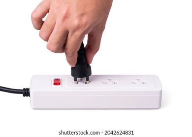 Extension Power Strip With Hand Holding Plug On White Background. Saving Energy And Power, Safety Dangerous Concept