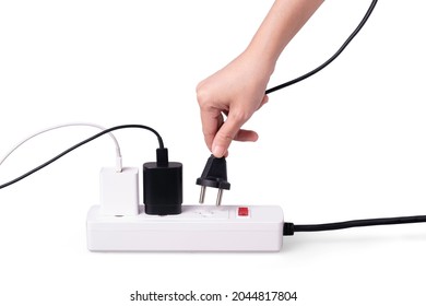 Extension Power Strip With Hand Holding Plug On White Background. Saving Energy And Power, Safety Dangerous Concept