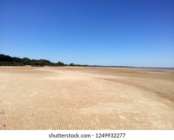 Extensive beach without people