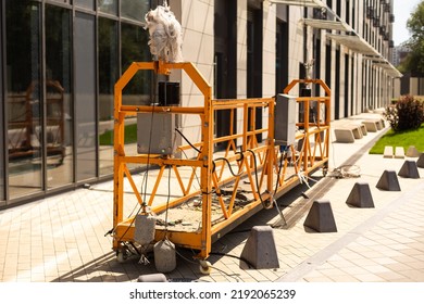 Extensive Scaffolding Providing Platforms For Work In Progress On A New Apartment Block,Tall Building Under Construction With Scaffolds, Construction Site Of New Building