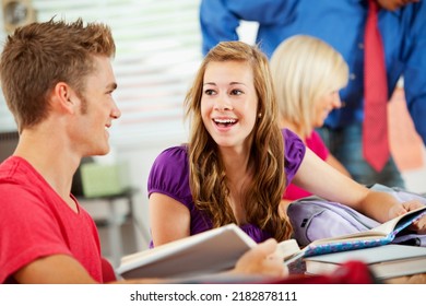 Extensive series of a multi-cultural group of students with a teacher, in a high school classroom setting. - Shutterstock ID 2182878111