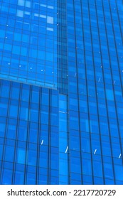 Exterior Of A Blue Building With Modern Architecture Style In Austin Texas. City Views With Facade Of Apartments Or Business Offices With Glass Wall Windows.