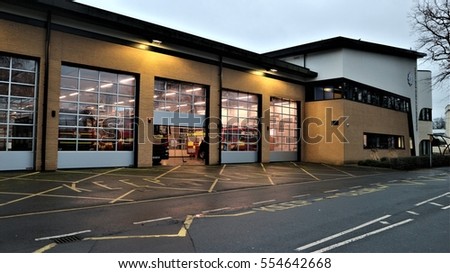Exterior of a British modern firestation with fire engines  