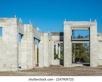 Exterior Concrete Walls Of An Upscale Single-family House Under Construction In A Suburban Development On A Sunny Morning In Southwest Florida