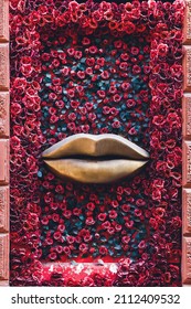 Exterior Design Of Beauty Salon Or Fashion Boutique. Decor Is Golden Lips With Red Roses On Display