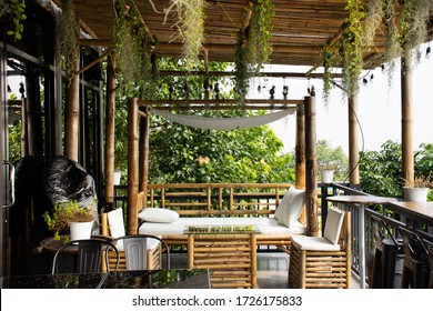 Exterior design and decoration furniture at terrace outdoor of cafe coffee shop for thai people and foreign travelers eat and drinks at Mukdahan, Thailand - Shutterstock ID 1726175833