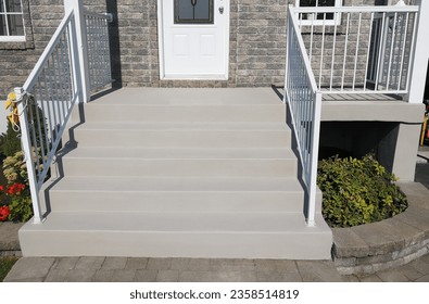 exterior design ideas - Concrete staircase resurfacing solutions with a beautiful acrylic color finish for residential homeowners.