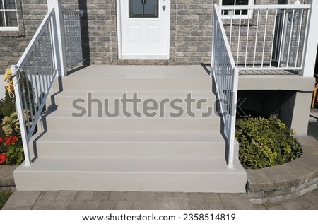 exterior design ideas - Concrete staircase resurfacing solutions with a beautiful acrylic color finish for residential homeowners.