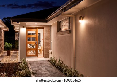 Exterior Dusk Images Of A Granny Flat Studio Residence At The Side Of A Suburban Home